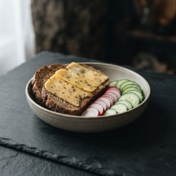 Illustration for the Rye bread with caraway cheddar and radish meal
